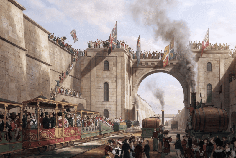Cuarta parada: Liverpool. El día en que nació la era del ferrocarril 1 A 19th-century color illustration depicting the opening of the Liverpool and Manchester Railway. Crowds in Victorian attire cheer from high stone walls and bridges as ornate passenger carriages and steam locomotives, decorated with various British flags, pass through a massive stone archway.
